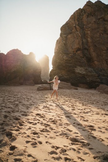 Woman Running on the Beach  · Free Stock Photo