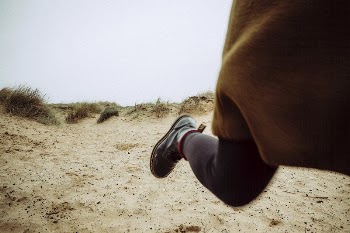 Woman running on the sand. | Free Photo - rawpixel