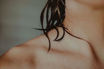 woman's broad shoulder