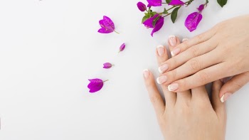 Woman's hands and flowers with copy space Free Photo