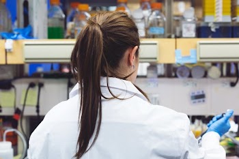 Woman Scientist Doing Experiment