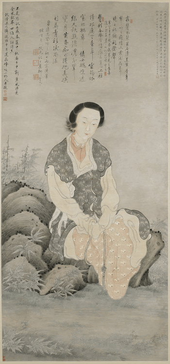 woman seated on rocks, wearing | Free Photo - rawpixel