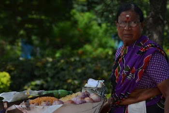 Woman Selling Food In The Street