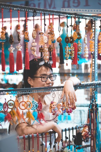 Woman Selling Multicolored Lucky Charms