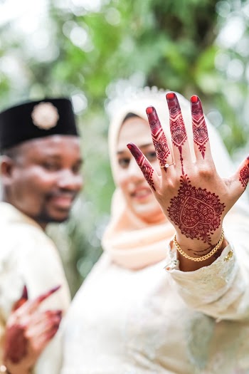 Woman Showing Her Mehndi Tattoo