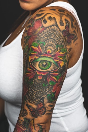 Woman Showing Her Tattoo