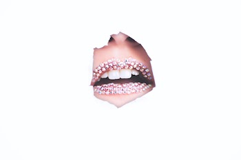 Woman Showing Lipstick