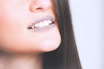 Woman Showing Silver Lipstick