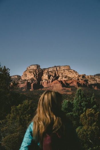 woman sightseeing canyon