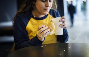 Woman Sipping On Straw