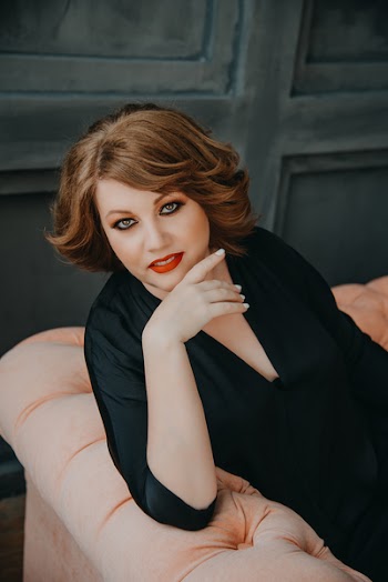 Woman Sit on Pink Bed
