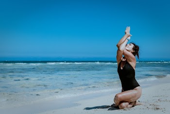 Woman Siting at Beach