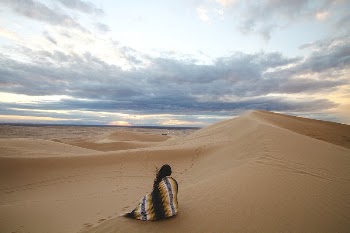 Woman sits in an Aztec | Free Photo - rawpixel