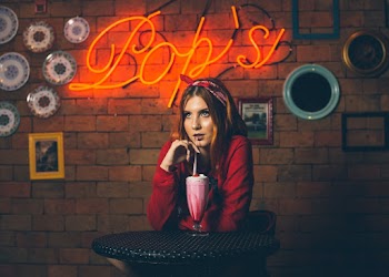 Woman Sitting at Table