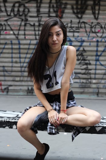 Woman Sitting Down on Bench