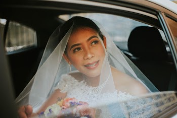 Woman Sitting in Vehicle