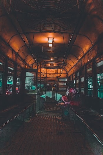 Woman Sitting Inside Bus