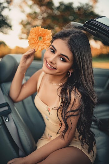 Woman Sitting Inside Car