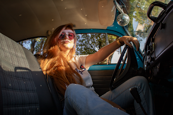 Woman Sitting Inside Vehicle