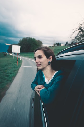 Woman Sitting Inside Vehicle