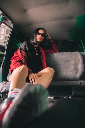 Woman Sitting Inside Vehicle