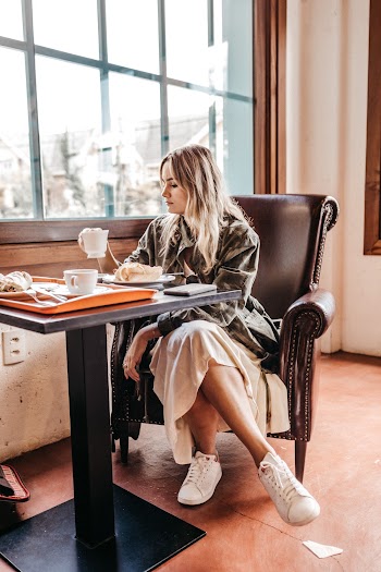 Woman Sitting On A Chair
