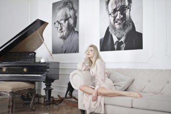 Woman Sitting on A Sofa