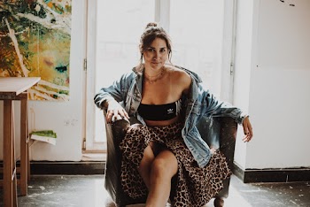 Woman Sitting on Armchair