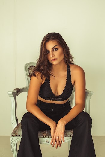 Woman Sitting on Armchair