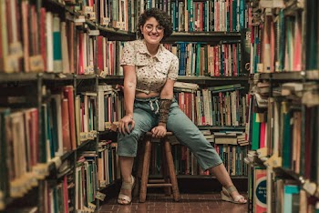 Woman Sitting on Barstool