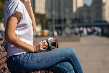 Woman Sitting on Bench