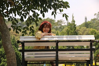 Woman Sitting on Bench