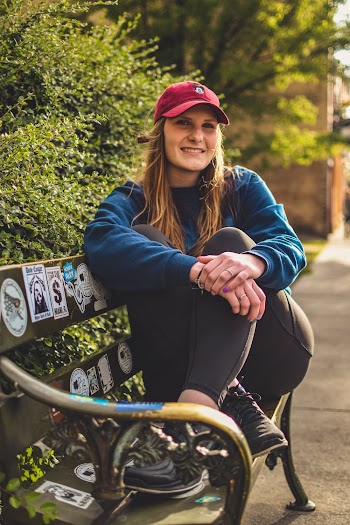 Woman Sitting on Bench