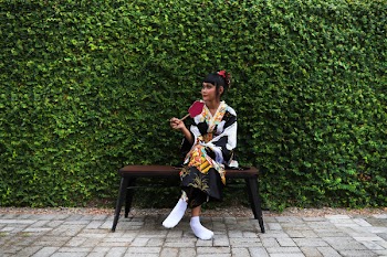 Woman Sitting on Bench