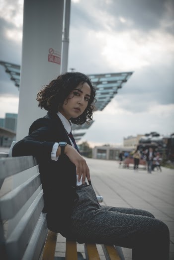 Woman Sitting on Bench