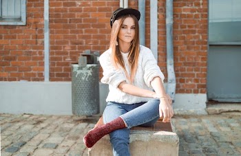 woman sitting on bench
