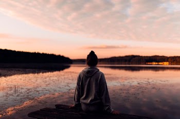 woman sitting on bench