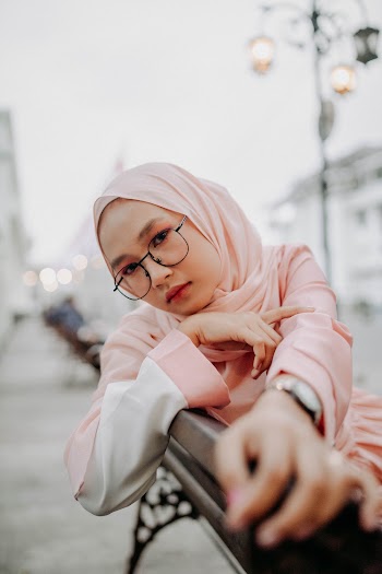 Woman Sitting on Bench