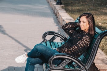 Woman Sitting on Bench
