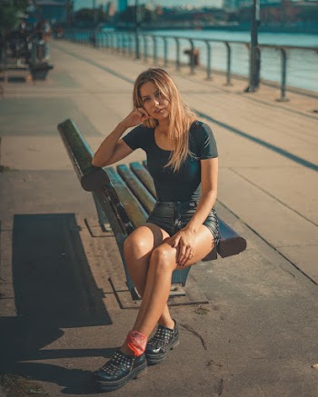 Woman Sitting on Bench