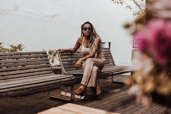 Woman Sitting on Bench