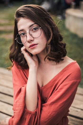 Woman Sitting On Bench