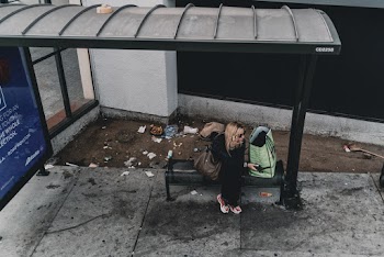 Woman Sitting on Bench
