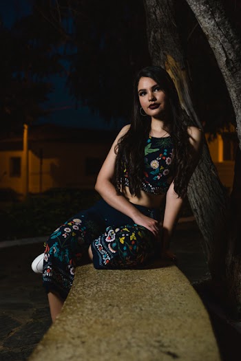 Woman Sitting on Bench Beside Tree