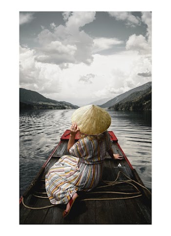 Woman Sitting On Boat