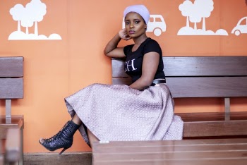 Woman Sitting On Brown Wooden Bench 