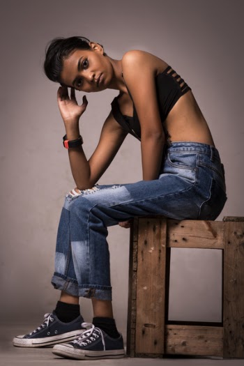 Woman Sitting On Brown Wooden Crate