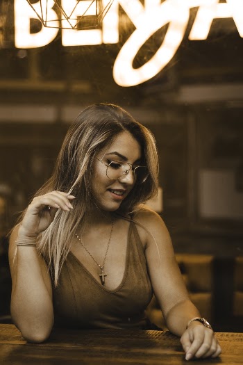 Woman Sitting on Chair
