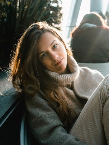 Woman Sitting on Chair