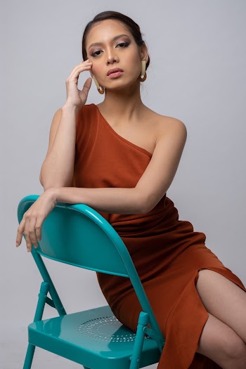 Woman Sitting on Chair